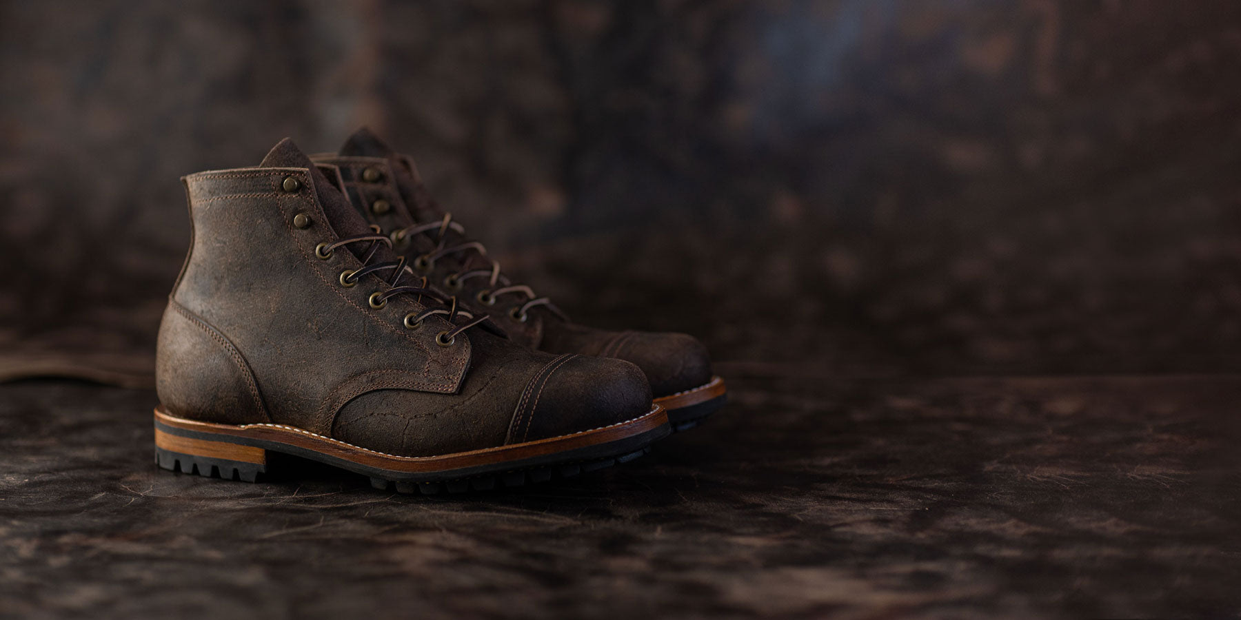 pair of truman boots in stone rambler leather on stone rambler leather